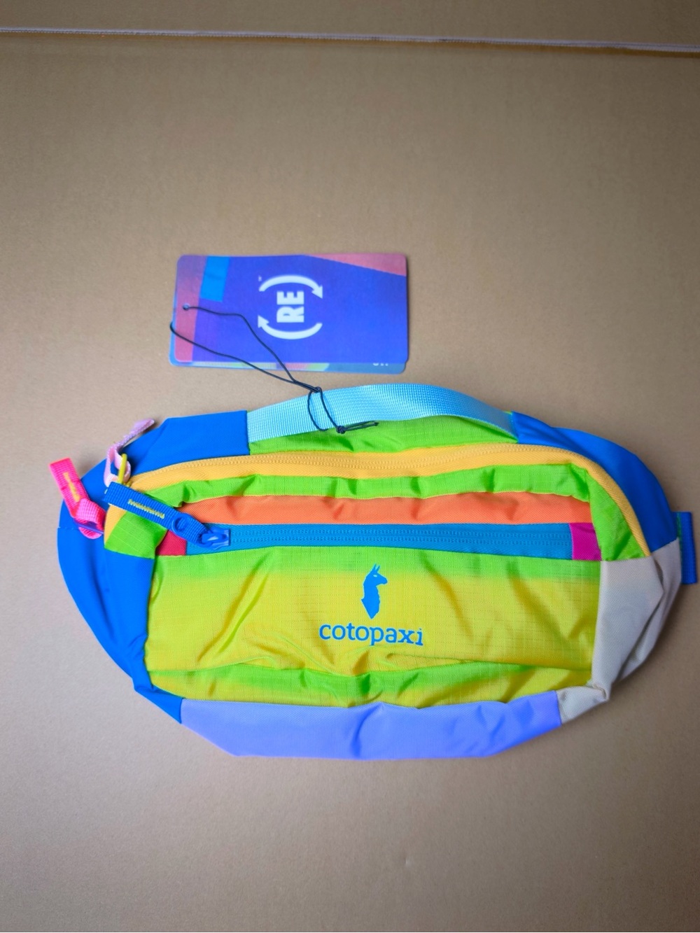 cotopaxi Kids Multicolor 1.5 L Waist Pack - Yellow, Green, Blue, Orange